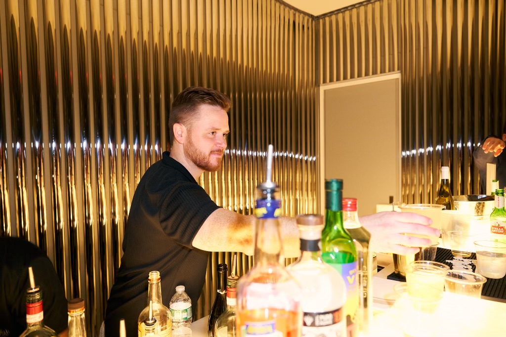 Cocktail bartender mixing drinks. Long Island Bartender for hire