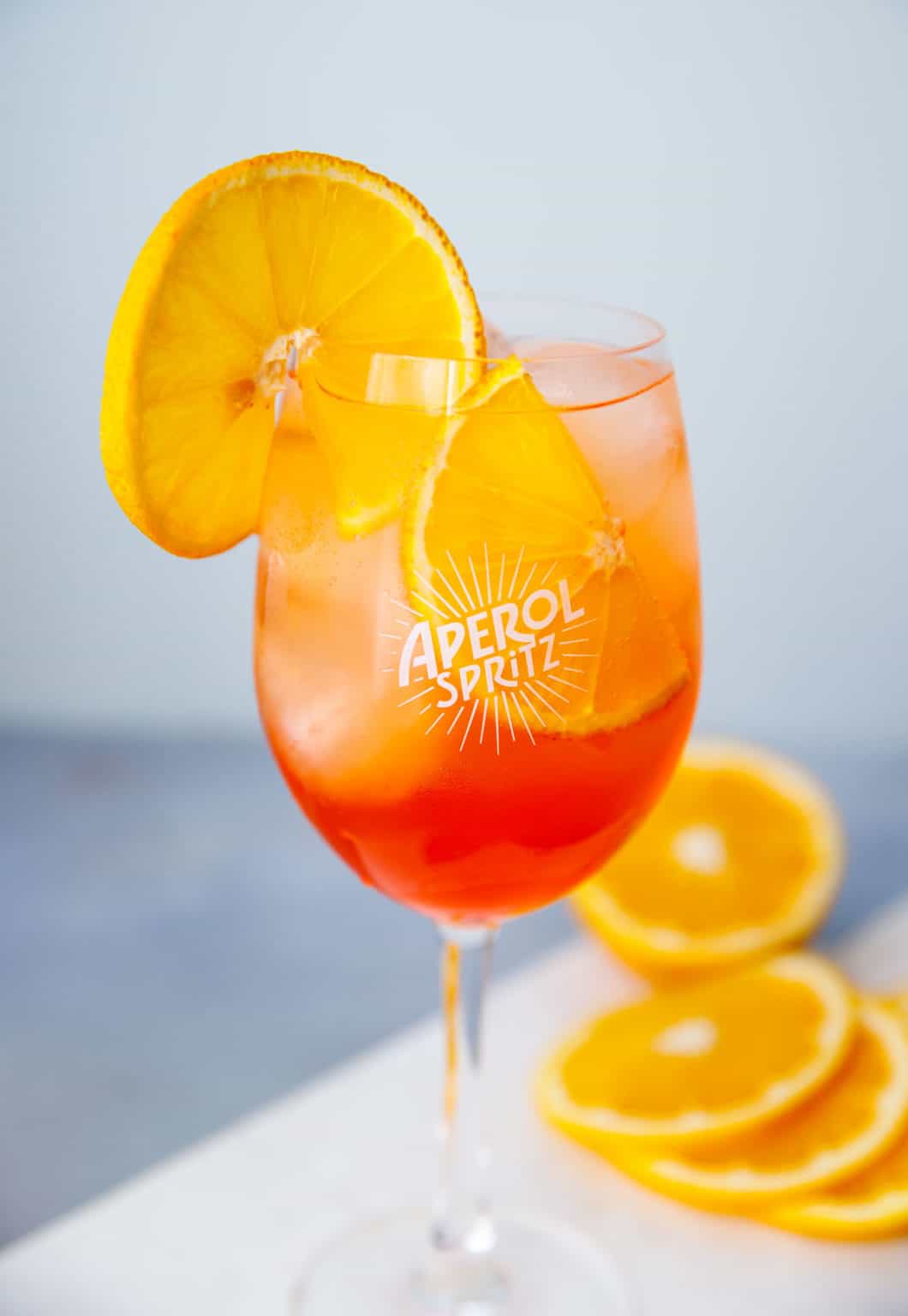 Aperol Spritz with orange slice served over ice