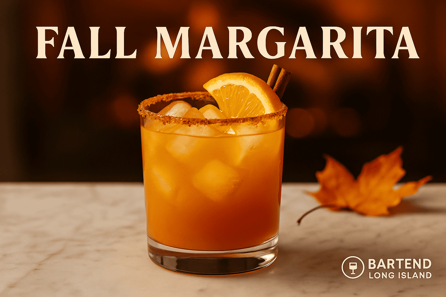 Fall Margarita cocktail with cinnamon sugar rim and lime wedge