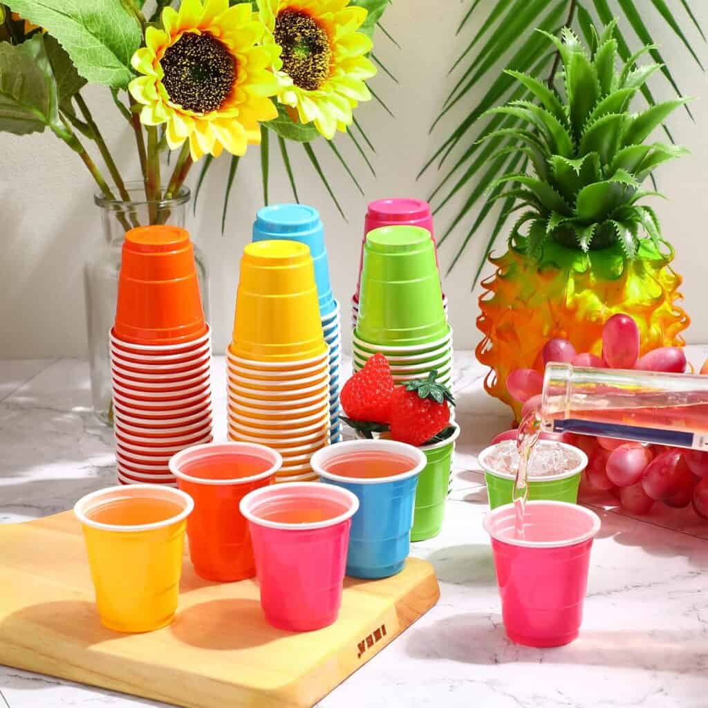 Decorative disposable party shot cups for milestone celebrations