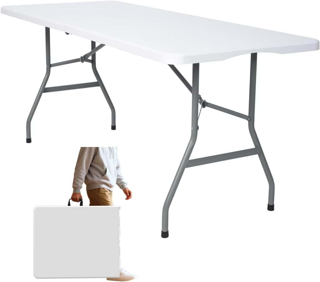 White folding six foot utility table with collapsible legs